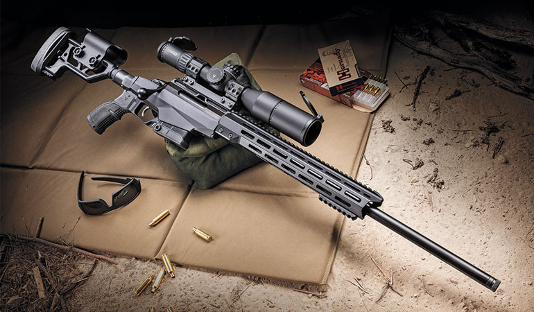 Tikka T3x TAC A1 bolt-action rifle with black aluminum chassis and M-LOK fore-end